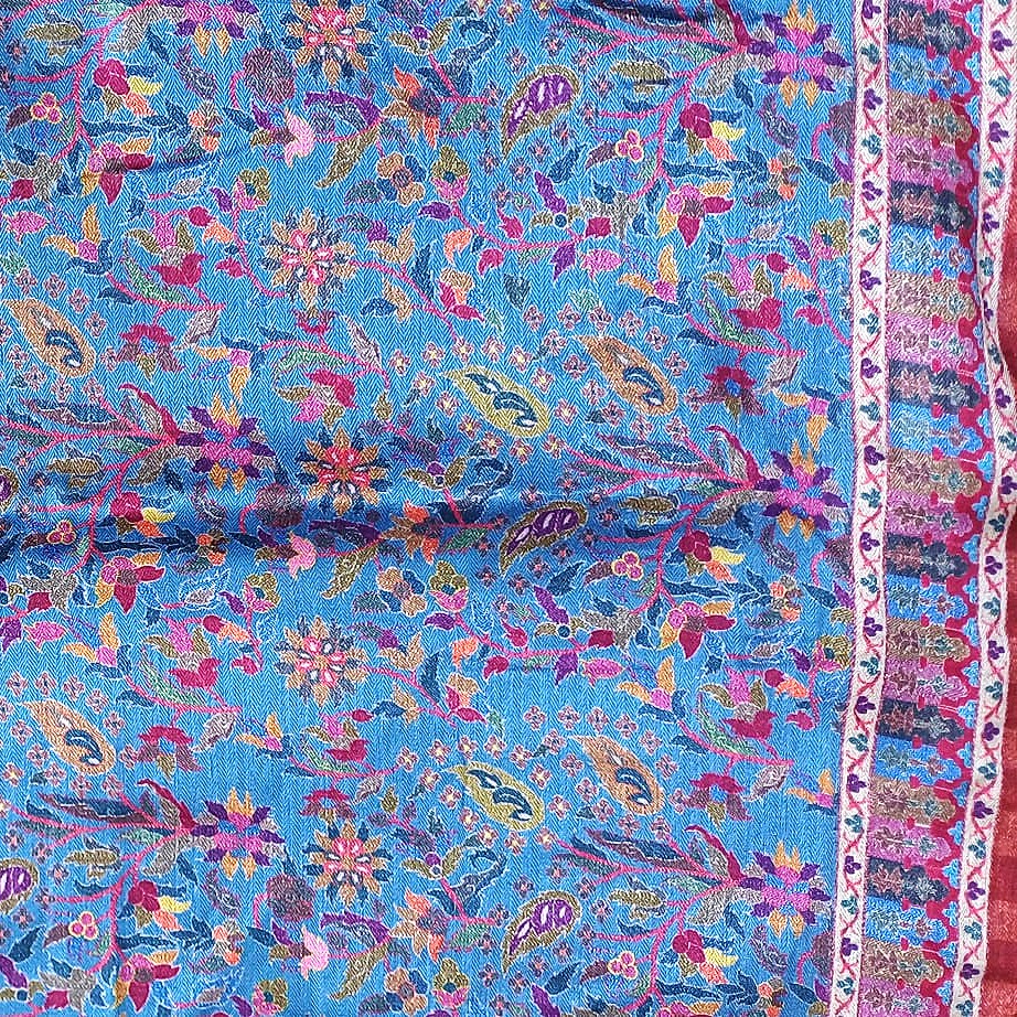 Tejido de semiseda estampado India azul con cenefas Julunggul